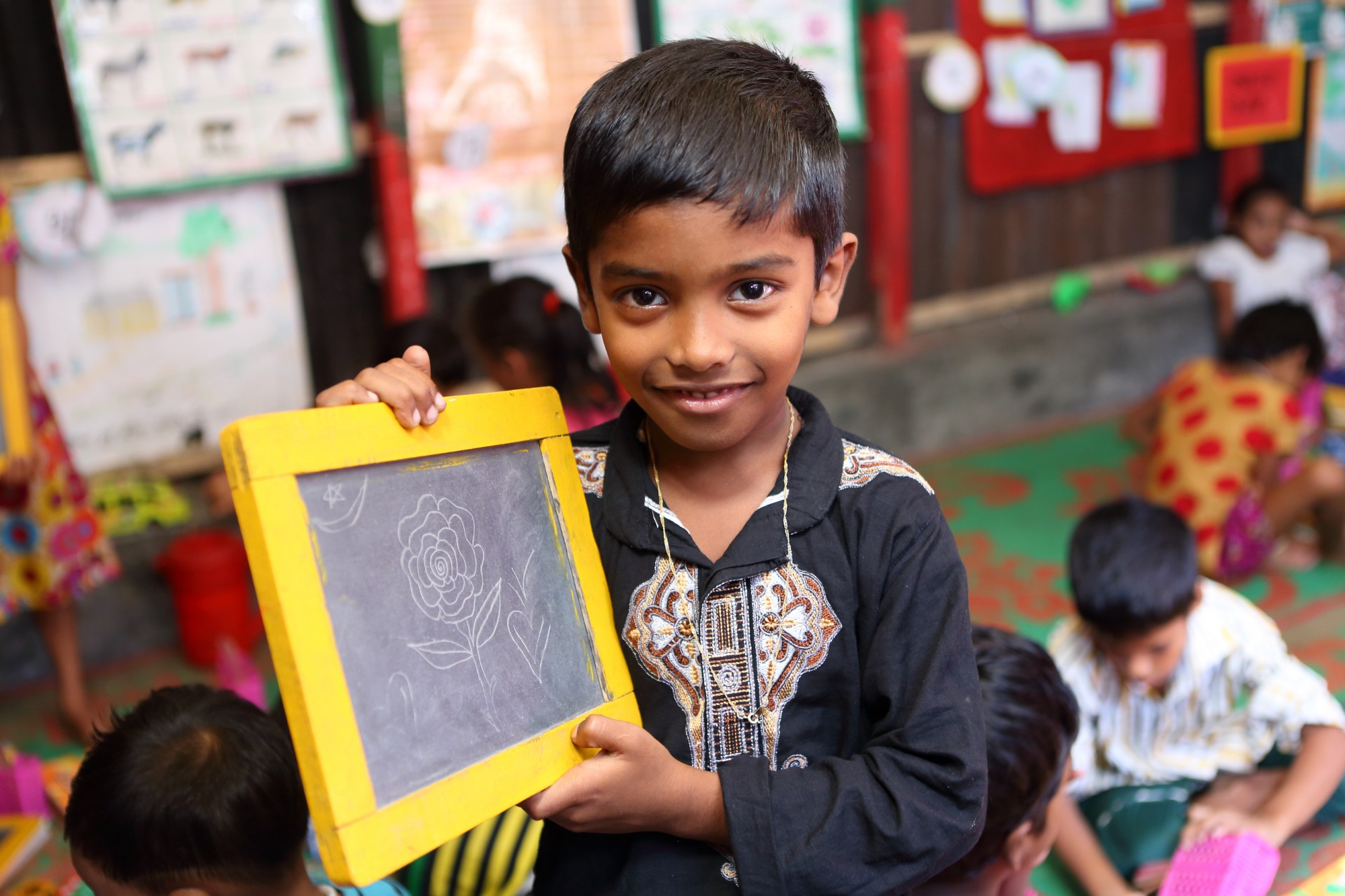 Sabbir, 6 ans, est élève dans une école maternelle du quartier de Korail à Dhaka au Bangladesh. Crédit : UNICEF Sabbir, 6 ans, est élève dans une école maternelle du quartier de Korail à Dhaka au Bangladesh. Crédit : UNICEF