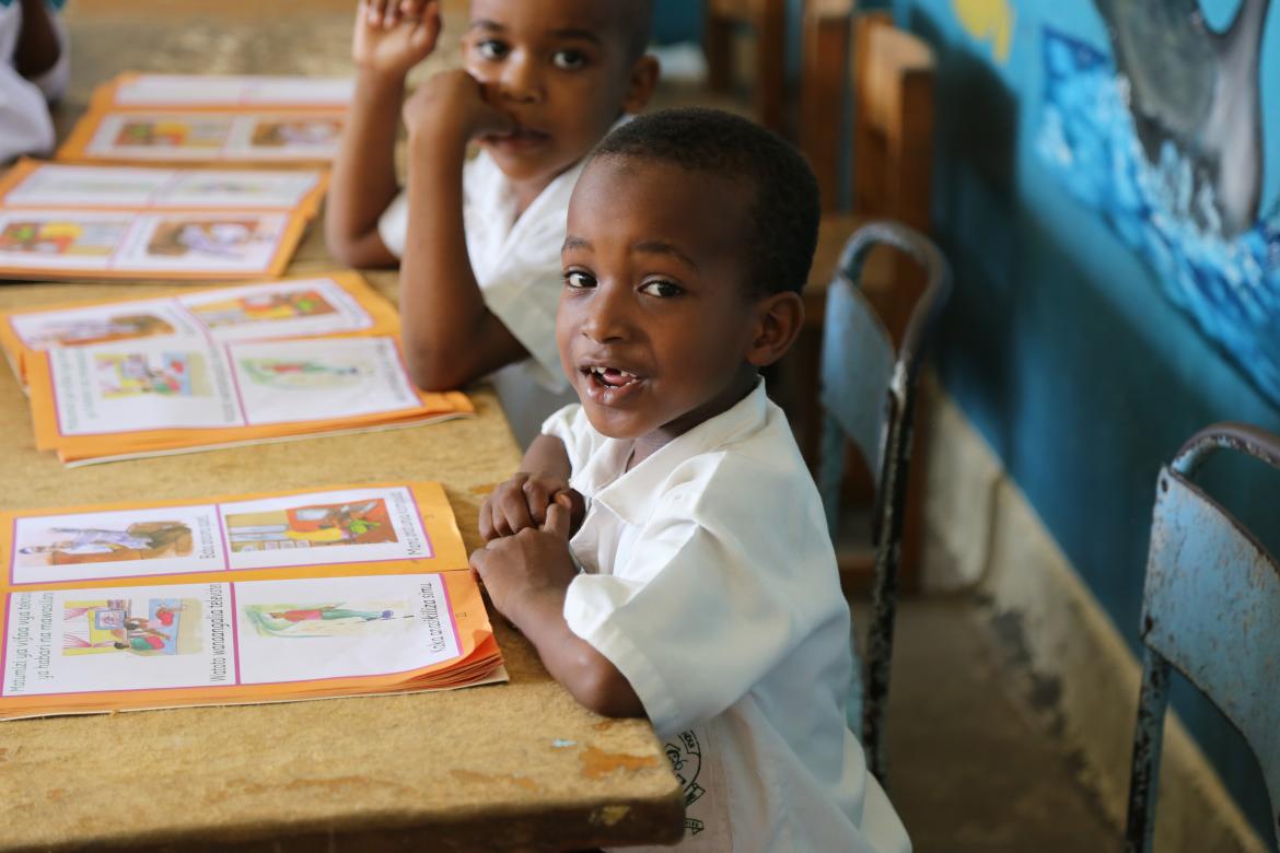 The children also look at the corresponding images in their textbooks, whose illustrations are large and visible to those that may have a visual impairment.