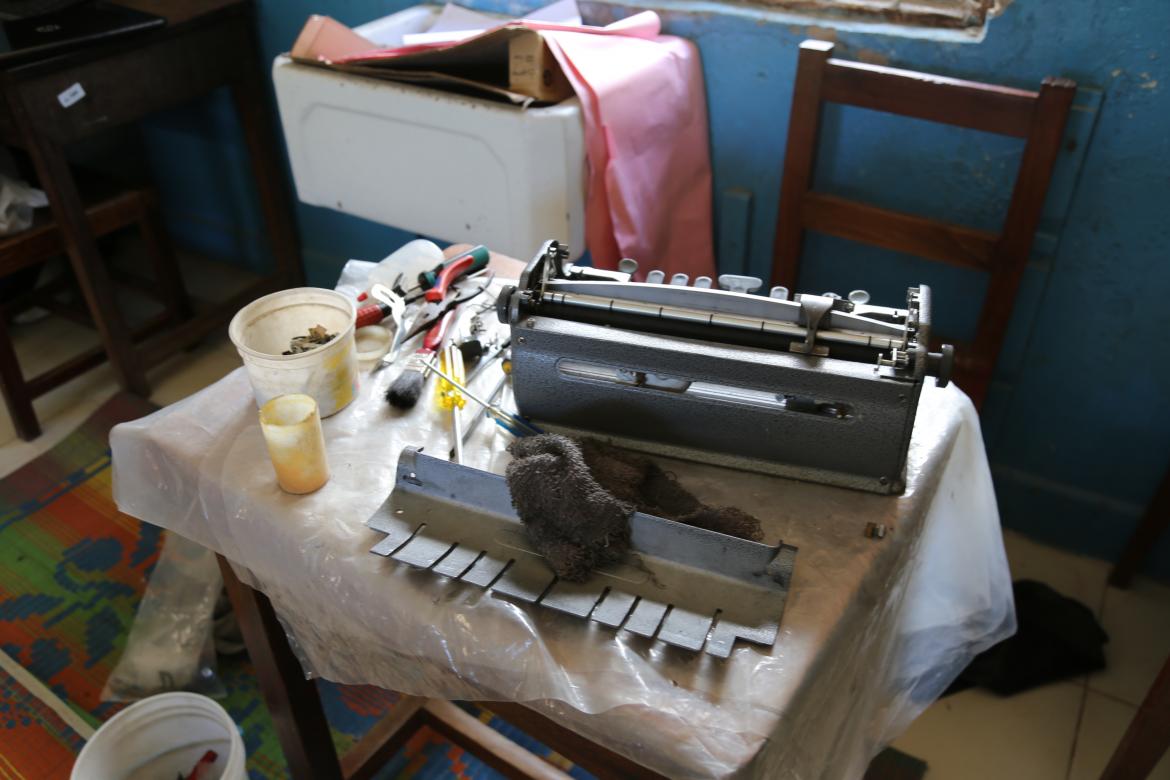 She has been trained to repair the Braille machines when they break down. She has been trained to repair the Braille machines when they break down.